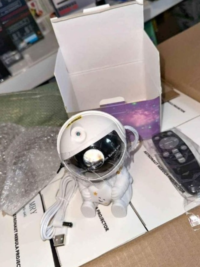 PROYECTOR DE LUZ DE ASTRONAUTA SENTADO